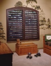 Stained wood plantation shutter. Custom made at AAA Blinds of Lakeland