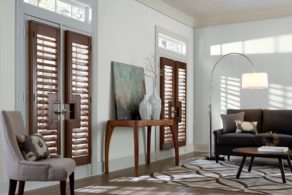 Plantation shutters with door handle cut outs. Available at AAA Blinds of Lakeland