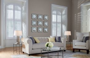 Arch top panel plantation shutters. Available at AAA Blinds of Lakeland
