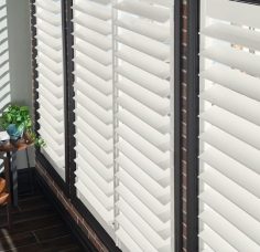 Large louvered plantation shutters. Available at AAA Blinds of Lakeland