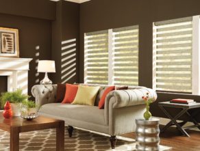 Living room layered roller shades. Available at AAA Blinds of Lakeland